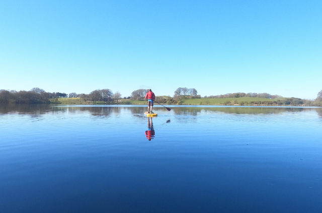 stand up paddle boarding at Talkin Tarn